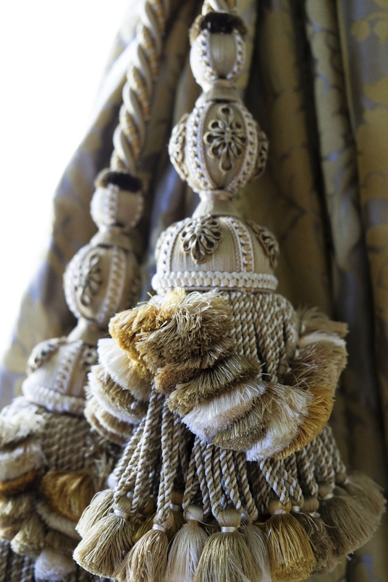 Detailed view of decorative curtain tassels